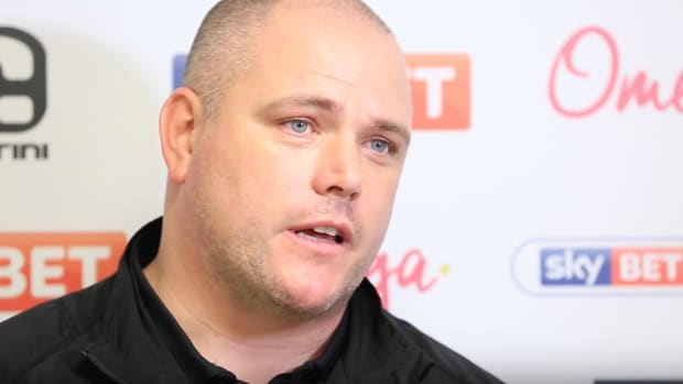 morecambe-manager-jim-bentley-tears-fans-pay-fine-video.png